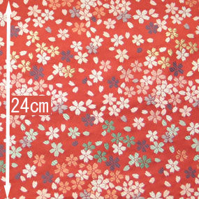ポリエステル金襴赤系 桜散らし柄 洛レイ胴入唐織 厚さ:厚手24cm角見本