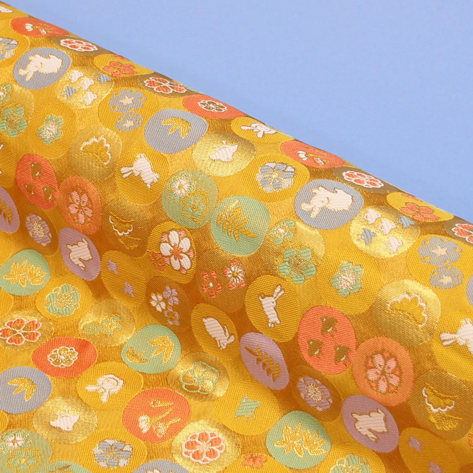 ポリエステル金襴 洛レイ胴入 金系 月ウサギ、松、梅 他 厚さ:厚手イメージ