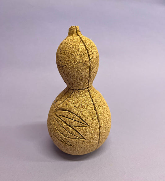 Matériau de la poupée en kimekomi : courge, pin, bambou et prune