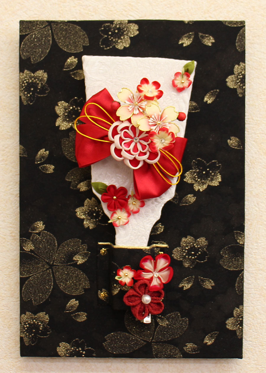 赤いリボンの髪飾りが外せる壁掛け羽子板　正面